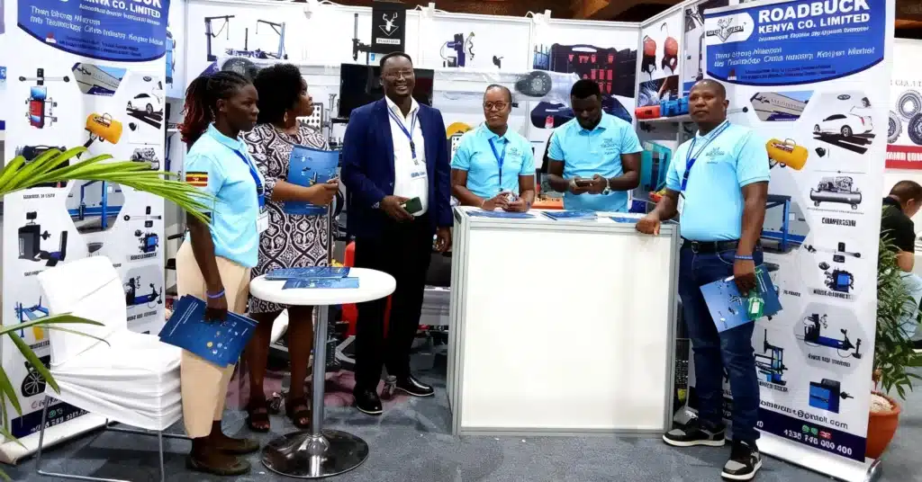 Road Buck staffs standind infront of their heavy-duty machines at the 26th AutoExpo Kenya 2025